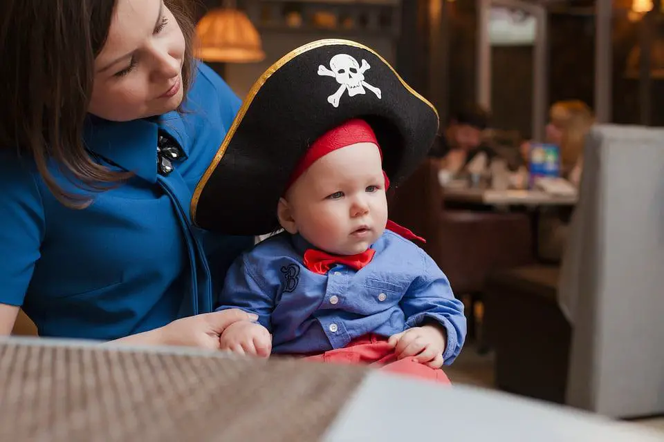 little kid in a pirate costume