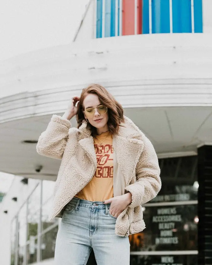 woman dressed in jeans and t-shirt for a 90s theme party