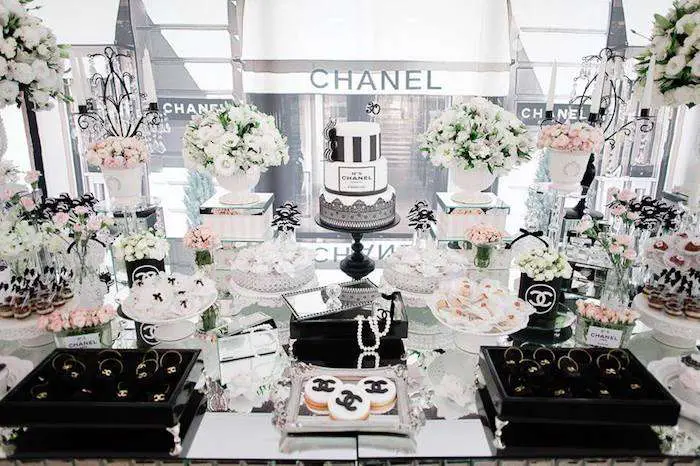 Coco Chanel inspired decor makes is one of the most stunning 50th birthday party themes