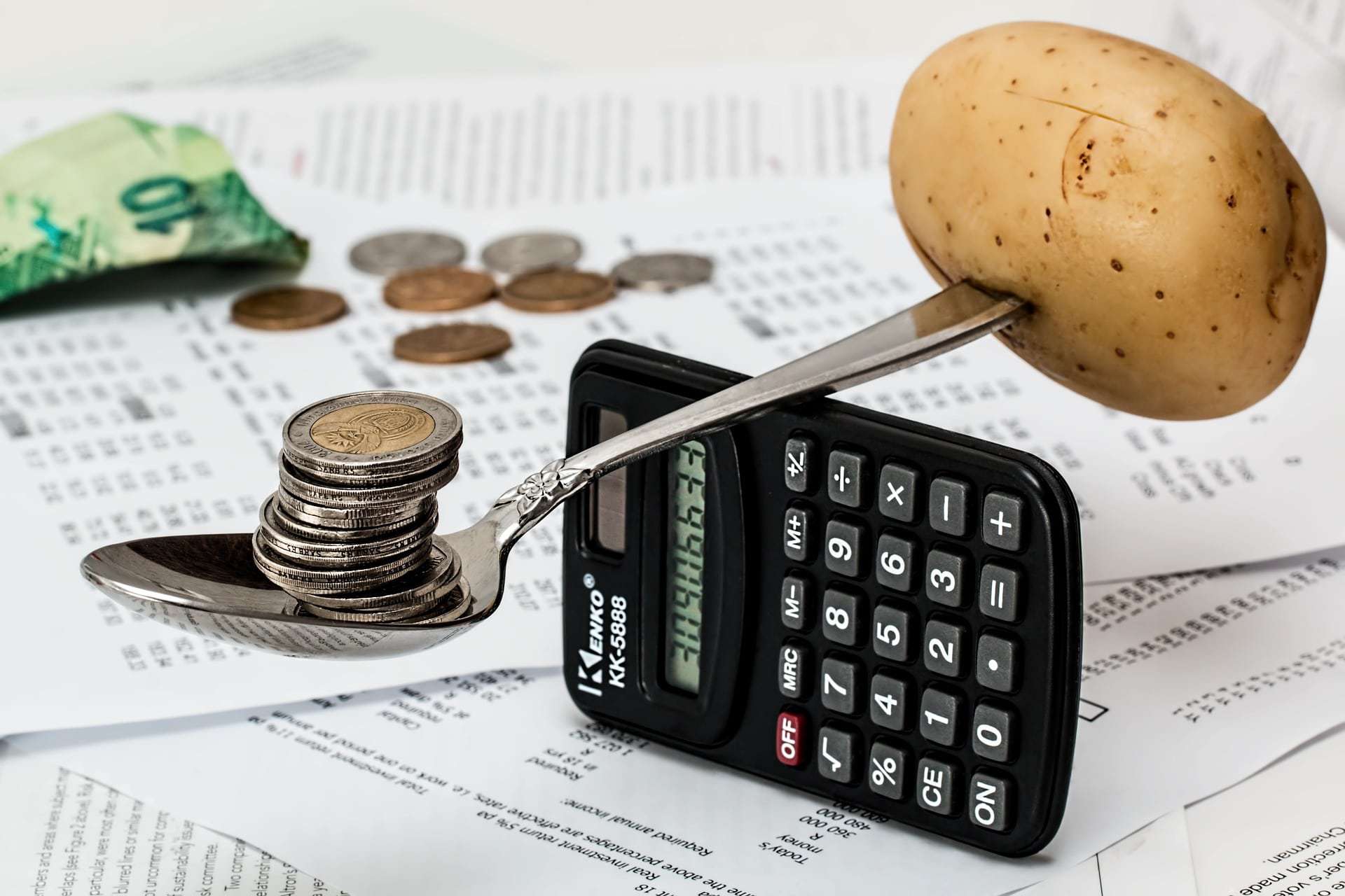 potato balancing on a calculator -- you can find great surprise birthday party ideas even if you're on a tight budget