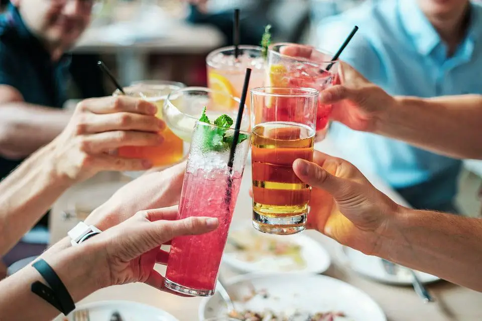 people drinking cocktail and doing some toast