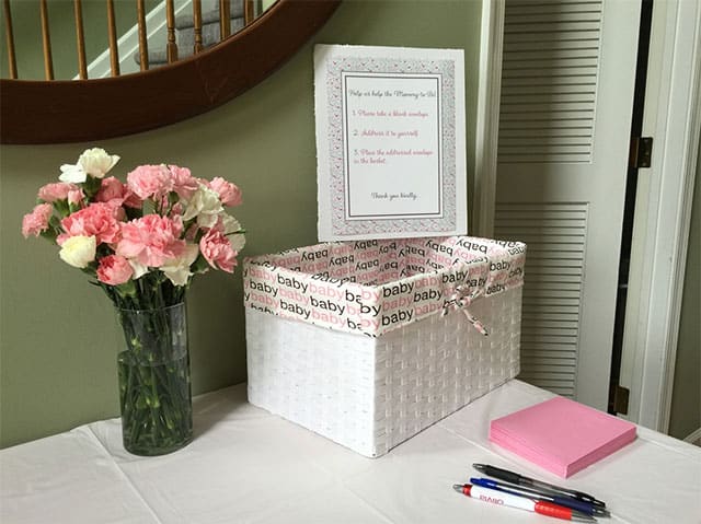 Flower and box on white table