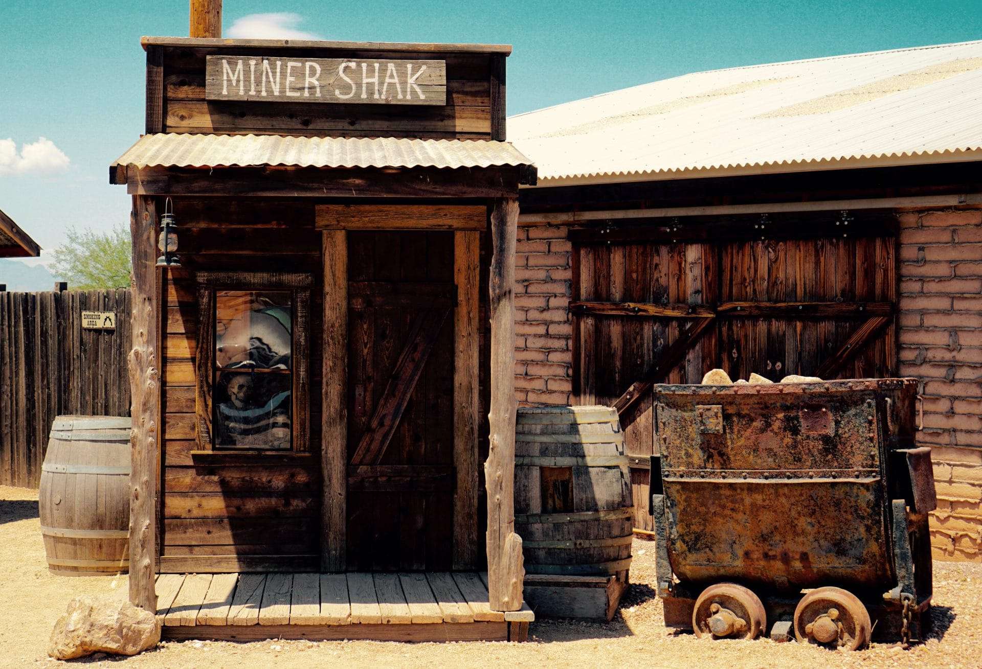 Wooden mini house and some barrels